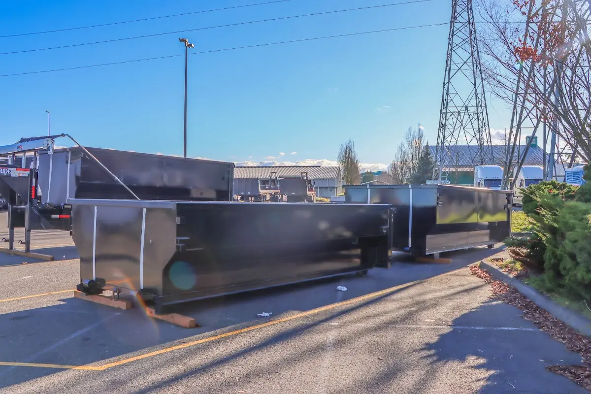 Roll-off dumpster ready for waste disposal at job site for 2 Yard Dumpster Rental in Newfane